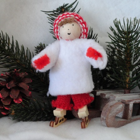 Lutin blanc patineur